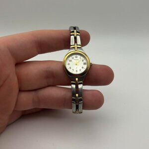 Vintage women’s white face Fossil watch with two toned band!